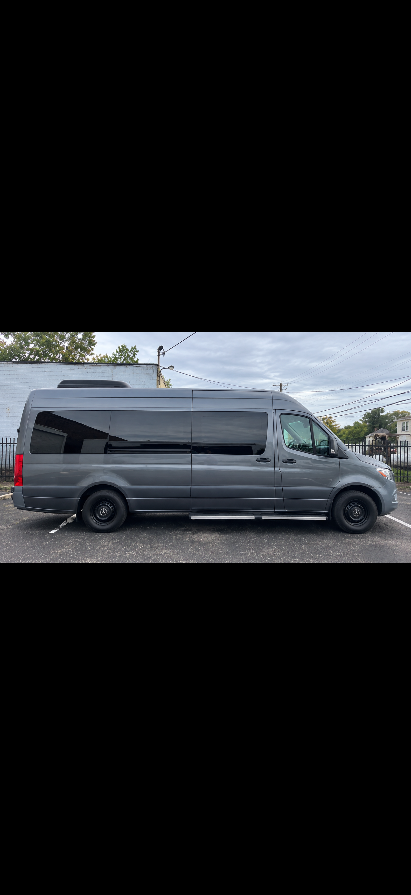 Grey Luxury Benz Sprinter exterior
